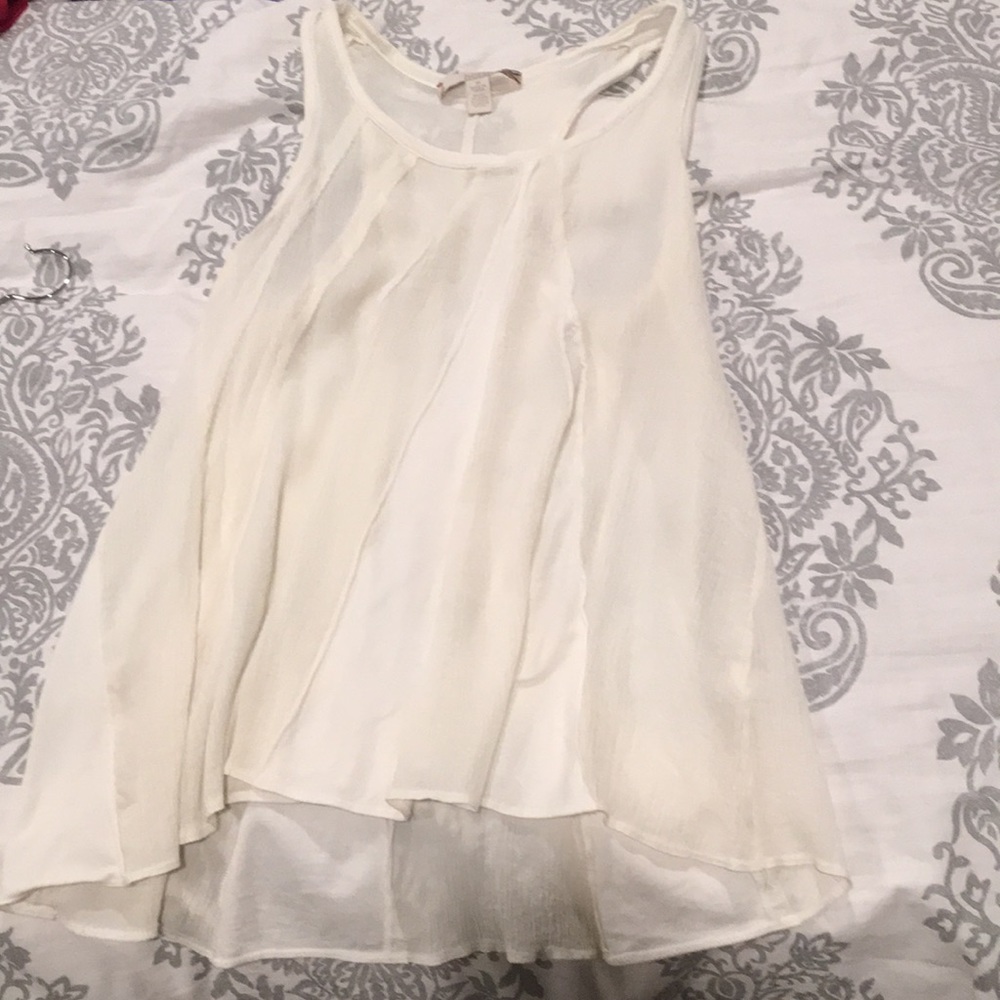 White gauze like material with cotton tank